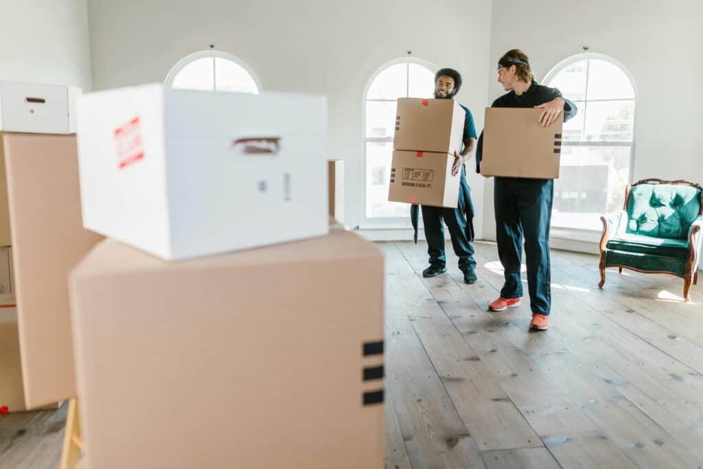 Local Lincoln movers bringing boxes.